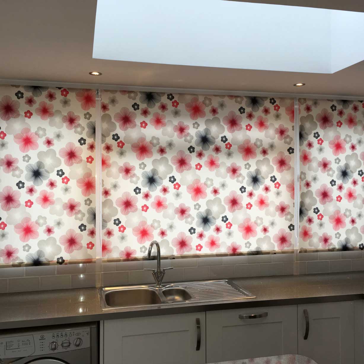 Contemporary red blue and grey flower pattern on kitchen roller blinds